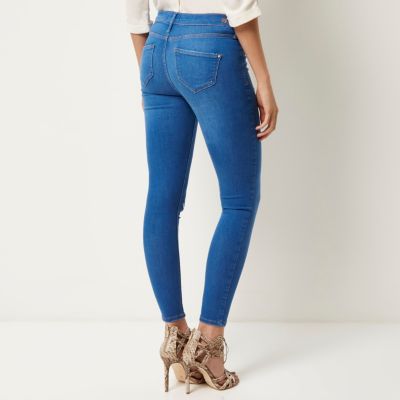 Bright blue ripped Molly jeggings